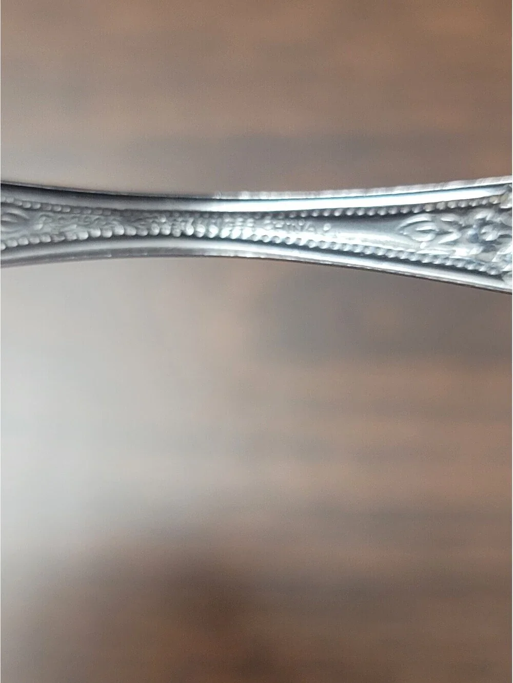 Vintage Stainless Steel Spoon and Fork Set with Ornate Floral Handles